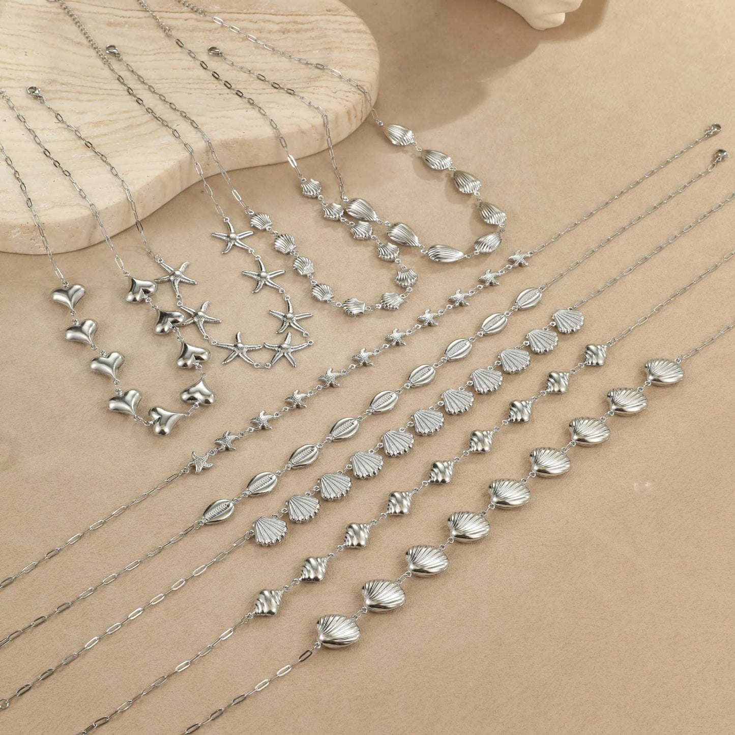 Collar de acero inoxidable de 18 g con colgantes de concha de estrella de mar